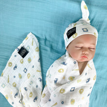 Load image into Gallery viewer, Baby baseball print Muslin organic cotton swaddles styled by mommy and me arabia