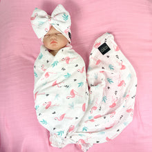 Load image into Gallery viewer, Baby flamingo pink printed Muslin organic cotton swaddles styled by mommy and me arabia