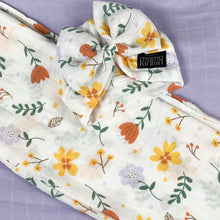 Load image into Gallery viewer, Sunshine blossom muslin organic cotton swaddles styled by mommy and me arabia