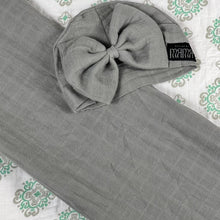 Load image into Gallery viewer, Solid moss grey muslin organic cotton swaddles styled by mommy and me arabia
