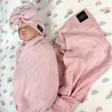 Load image into Gallery viewer, Solid rustic pink muslin organic cotton swaddles styled by mommy and me arabia