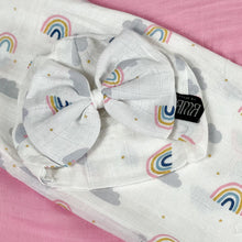 Load image into Gallery viewer, Baby rainbow printed Muslin organic cotton swaddles styled by mommy and me arabia