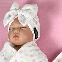 Load image into Gallery viewer, Floral block printed Muslin organic cotton swaddles styled by mommy and me arabia