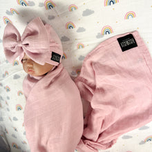 Load image into Gallery viewer, Solid rustic pink muslin organic cotton swaddles styled by mommy and me arabia