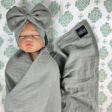 Load image into Gallery viewer, Solid moss grey muslin organic cotton swaddles styled by mommy and me arabia
