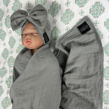 Load image into Gallery viewer, Solid moss grey muslin organic cotton swaddles styled by mommy and me arabia