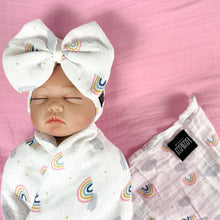 Load image into Gallery viewer, Baby rainbow printed Muslin organic cotton swaddles styled by mommy and me arabia
