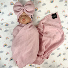 Load image into Gallery viewer, Solid rustic pink muslin organic cotton swaddles styled by mommy and me arabia