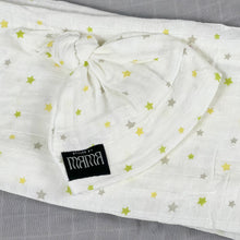 Load image into Gallery viewer, Star World Muslin organic cotton swaddles styled by mommy and me Arabia