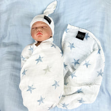 Load image into Gallery viewer, Baby blue stars print muslin organic cotton swaddles styled by mommy and me Arabia