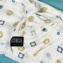 Load image into Gallery viewer, Baby baseball print Muslin organic cotton swaddles styled by mommy and me arabia