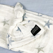 Load image into Gallery viewer, Baby blue stars print muslin organic cotton swaddles styled by mommy and me Arabia