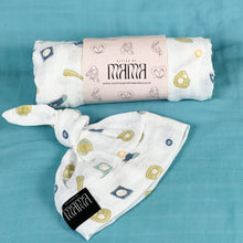 Load image into Gallery viewer, Baby baseball print Muslin organic cotton swaddles styled by mommy and me arabia