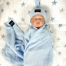 Load image into Gallery viewer, Solid baby blue muslin organic cotton swaddles styled by mommy and me arabia