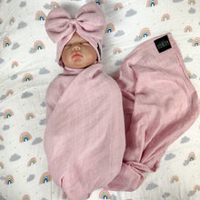 Load image into Gallery viewer, Solid rustic pink muslin organic cotton swaddles styled by mommy and me arabia