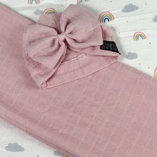 Load image into Gallery viewer, Solid rustic pink muslin organic cotton swaddles styled by mommy and me arabia