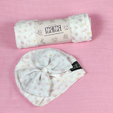 Load image into Gallery viewer, Floral block printed Muslin organic cotton swaddles styled by mommy and me arabia