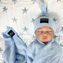 Load image into Gallery viewer, Solid baby blue muslin organic cotton swaddles styled by mommy and me arabia