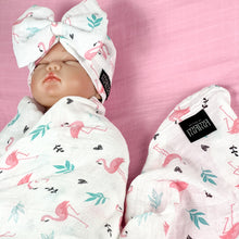 Load image into Gallery viewer, Baby flamingo pink printed Muslin organic cotton swaddles styled by mommy and me arabia