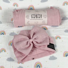 Load image into Gallery viewer, Solid rustic pink muslin organic cotton swaddles styled by mommy and me arabia