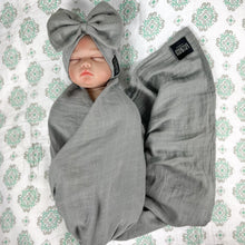 Load image into Gallery viewer, Solid moss grey muslin organic cotton swaddles styled by mommy and me arabia