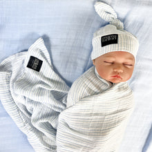 Load image into Gallery viewer, Baby blue stripes print muslin organic cotton swaddles styled by mommy and me arabia
