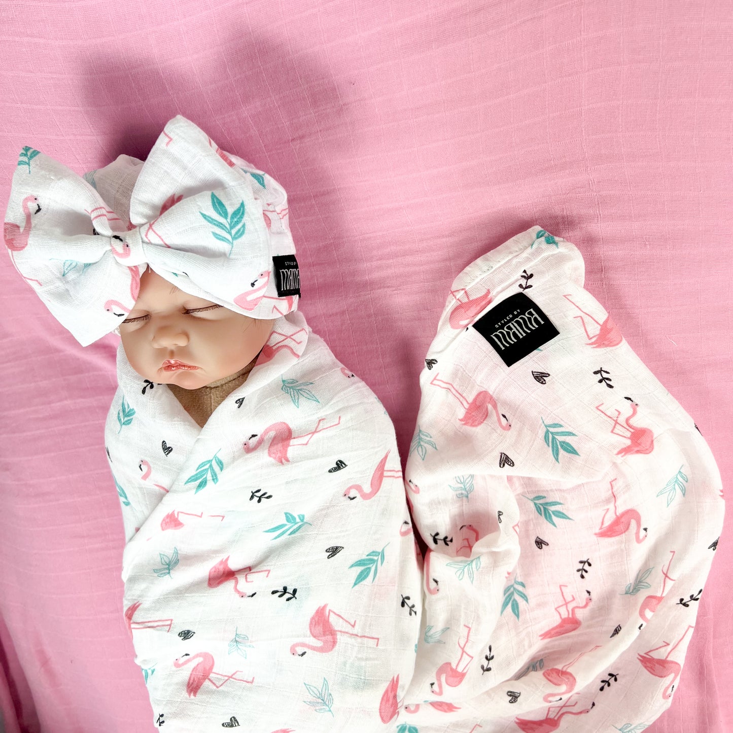 Baby flamingo pink printed Muslin organic cotton swaddles styled by mommy and me arabia