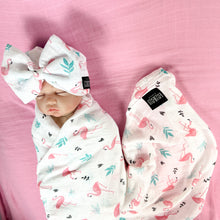 Load image into Gallery viewer, Baby flamingo pink printed Muslin organic cotton swaddles styled by mommy and me arabia
