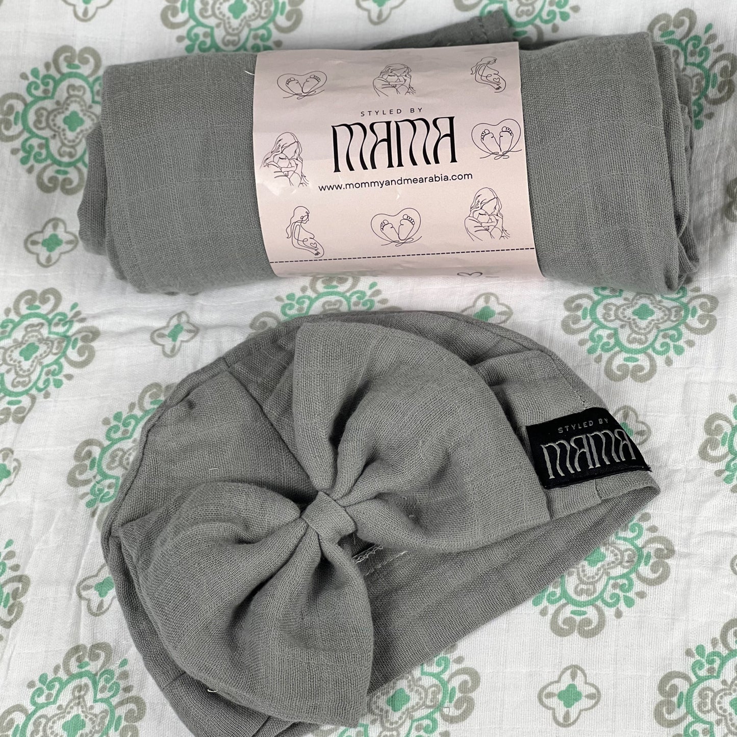 Solid moss grey muslin organic cotton swaddles styled by mommy and me arabia