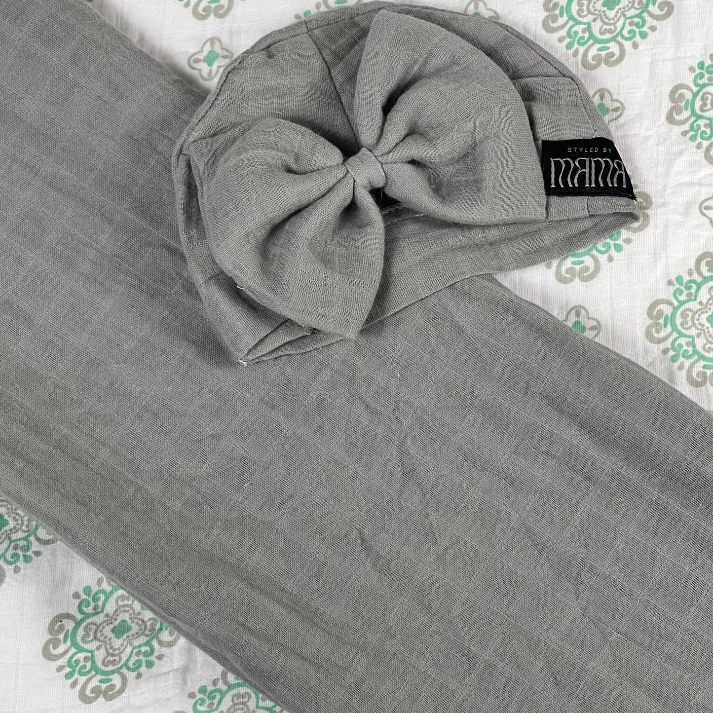 Solid moss grey muslin organic cotton swaddles styled by mommy and me arabia