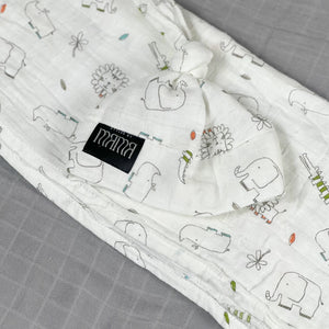 Wild world Muslin organic cotton swaddles styled by mommy and me arabia