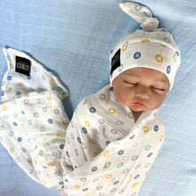 Load image into Gallery viewer, Button stars blue print muslin organic cotton swaddles styled by mommy and me arabia
