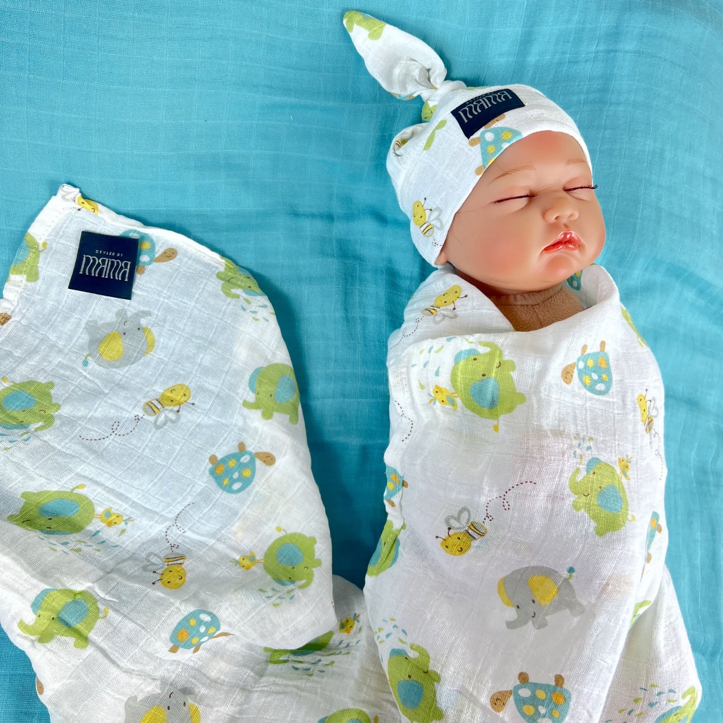 Turtle World printed Muslin organic cotton swaddles styled by mommy and me arabia