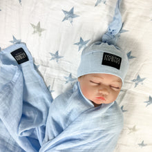 Load image into Gallery viewer, Solid baby blue muslin organic cotton swaddles styled by mommy and me arabia
