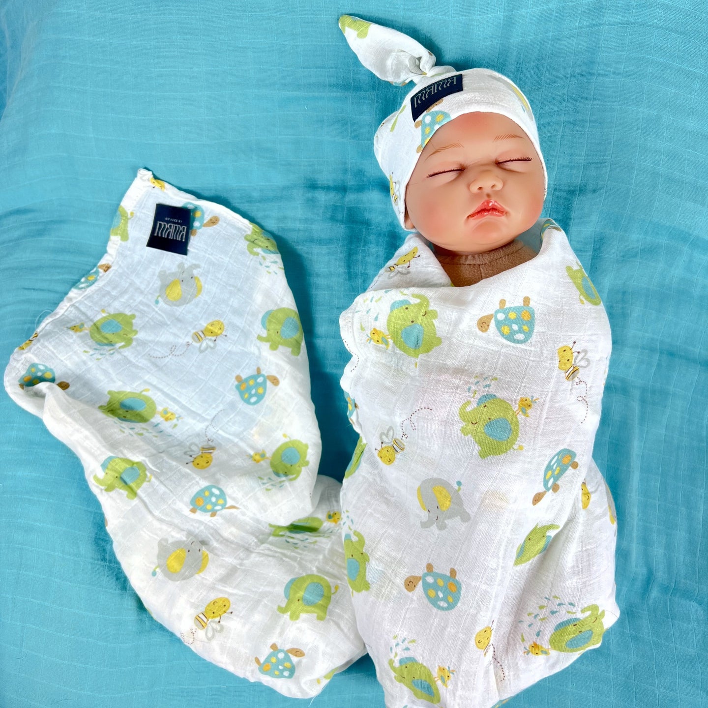 Turtle World printed Muslin organic cotton swaddles styled by mommy and me arabia