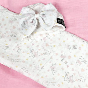 Happy bunny pink printed Muslin organic cotton swaddles styled by mommy and me arabia