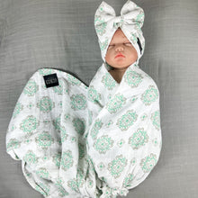 Load image into Gallery viewer, Baby green block printed Muslin organic cotton swaddles styled by mommy and me arabia
