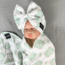 Load image into Gallery viewer, Baby green block printed Muslin organic cotton swaddles styled by mommy and me arabia
