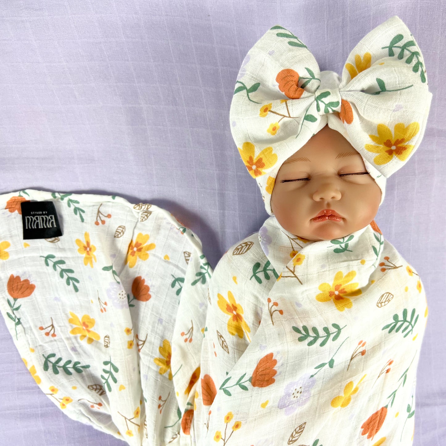 Sunshine blossom muslin organic cotton swaddles styled by mommy and me arabia