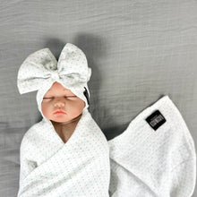 Load image into Gallery viewer, Green polka dots printed Muslin organic cotton swaddles styled by mommy and me arabia
