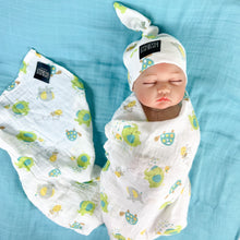 Load image into Gallery viewer, Turtle World printed Muslin organic cotton swaddles styled by mommy and me arabia
