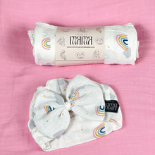 Load image into Gallery viewer, Baby rainbow printed Muslin organic cotton swaddles styled by mommy and me arabia
