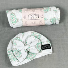 Load image into Gallery viewer, Baby green block printed Muslin organic cotton swaddles styled by mommy and me arabia
