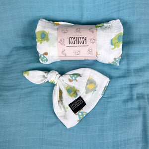 Turtle World printed Muslin organic cotton swaddles styled by mommy and me arabia