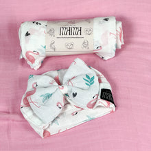 Load image into Gallery viewer, Baby flamingo pink printed Muslin organic cotton swaddles styled by mommy and me arabia
