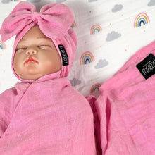 Load image into Gallery viewer, Solid baby pink muslin organic cotton swaddles styled by mommy and me arabia
