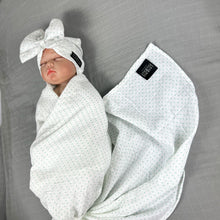 Load image into Gallery viewer, Green polka dots printed Muslin organic cotton swaddles styled by mommy and me arabia
