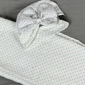 Green polka dots printed Muslin organic cotton swaddles styled by mommy and me arabia