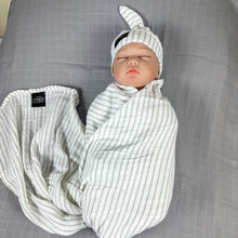 Load image into Gallery viewer, Grey stripes Muslin organic cotton swaddles styled by mommy and me arabia
