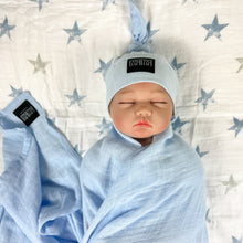 Load image into Gallery viewer, Solid baby blue muslin organic cotton swaddles styled by mommy and me arabia
